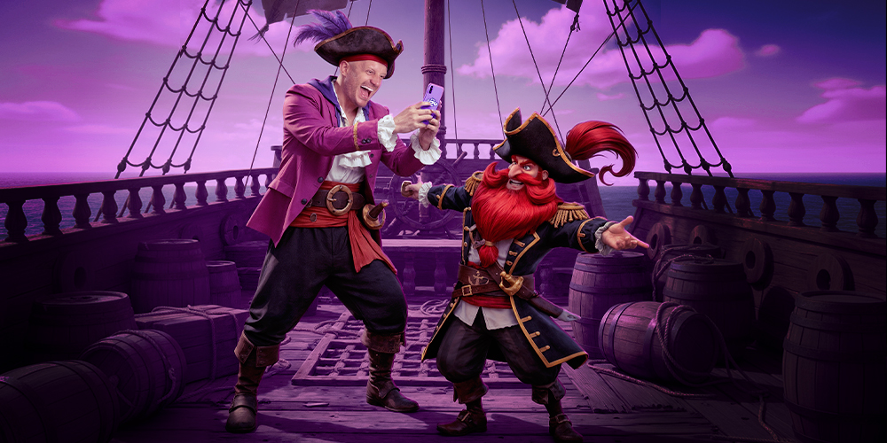 FACUNDO ARRIBA DE UN BARCO PIRATA JUGANDO EN SU TELEFONO EN PLAYUZU MIENTRAS ENFRENTE D EL SE ENCUENTRA UN PERSONAJE DE. ELSLOT.